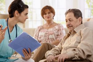 bigstock-Nurse-talking-with-elderly-peo-13106801